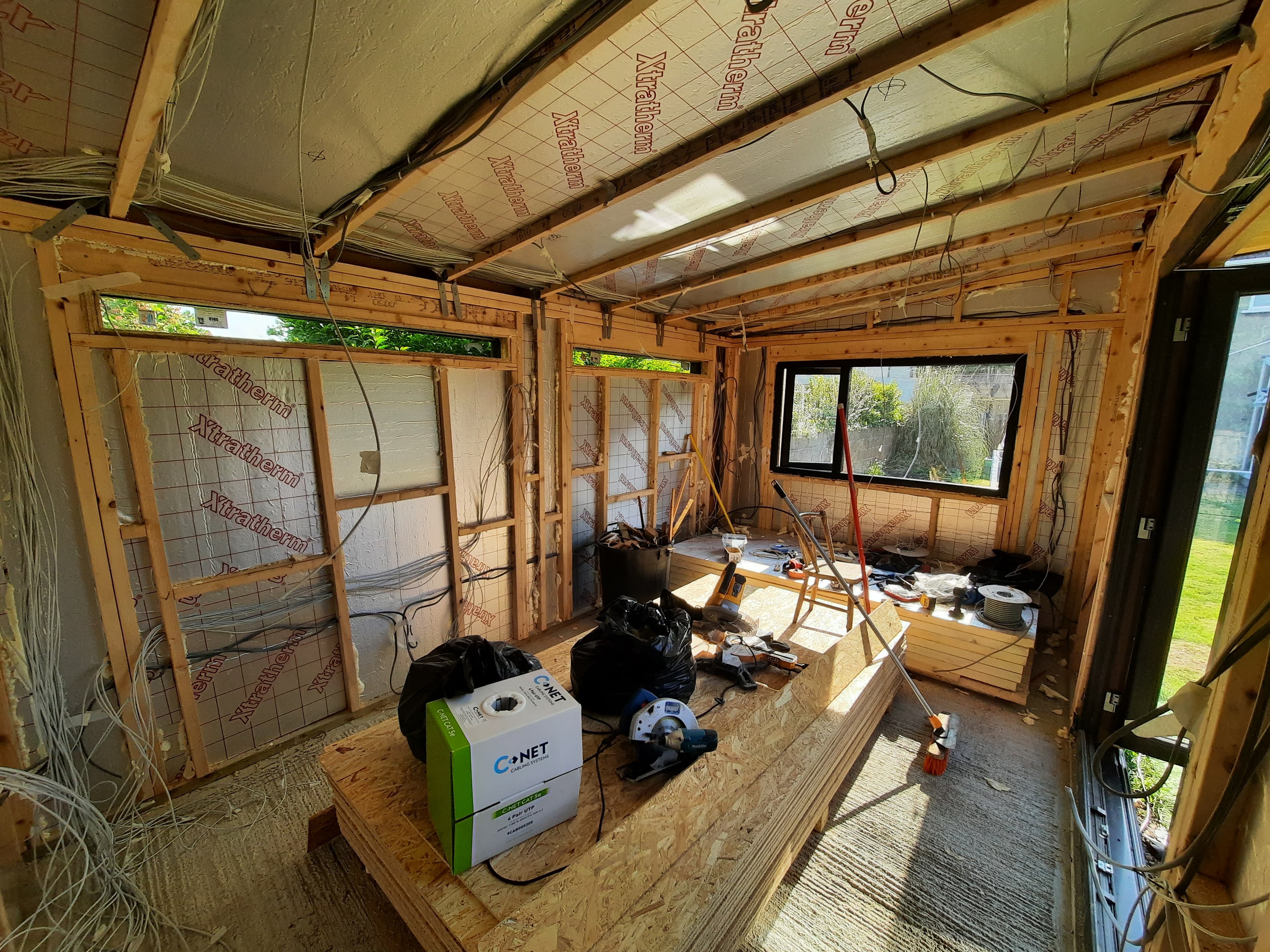 Installing first fix electrics in garden room